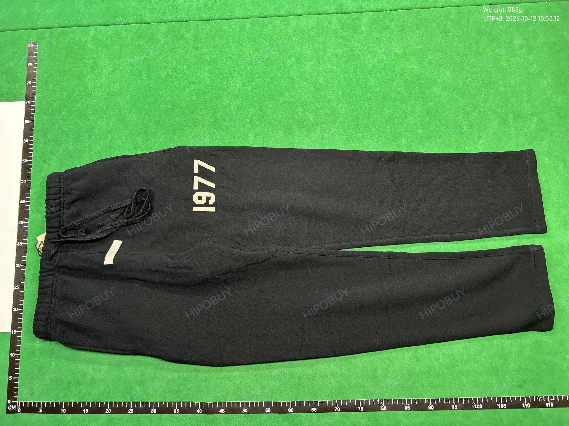 Foto QC 2 de Fear of God Essentials 1977 Sweatpants Black