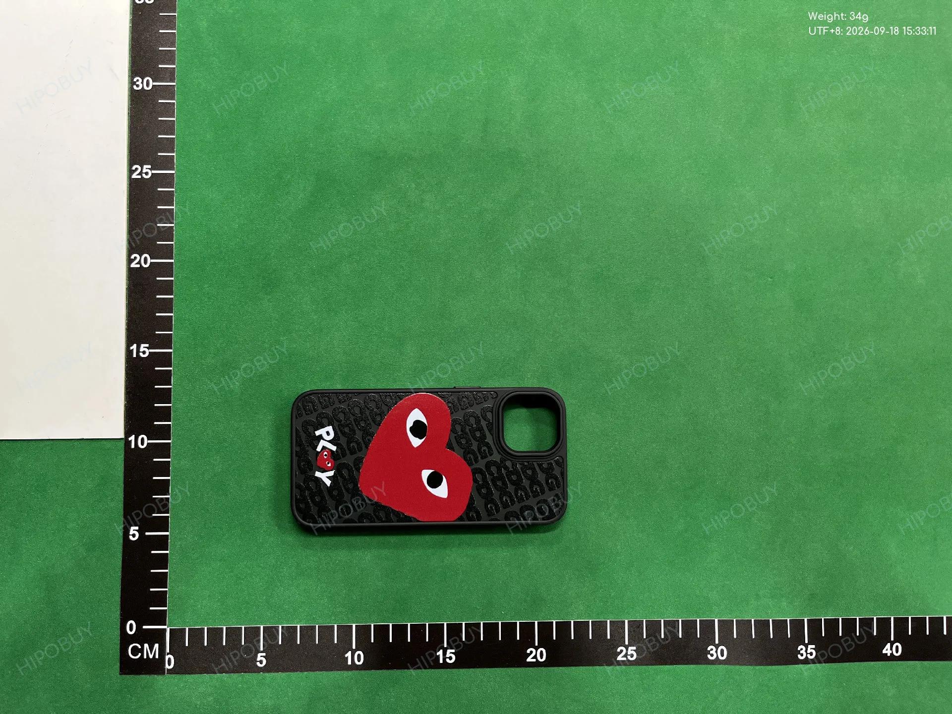 Foto QC 1 de Comme des Garcons PLAY Silicone Case for iPhone 14 Black