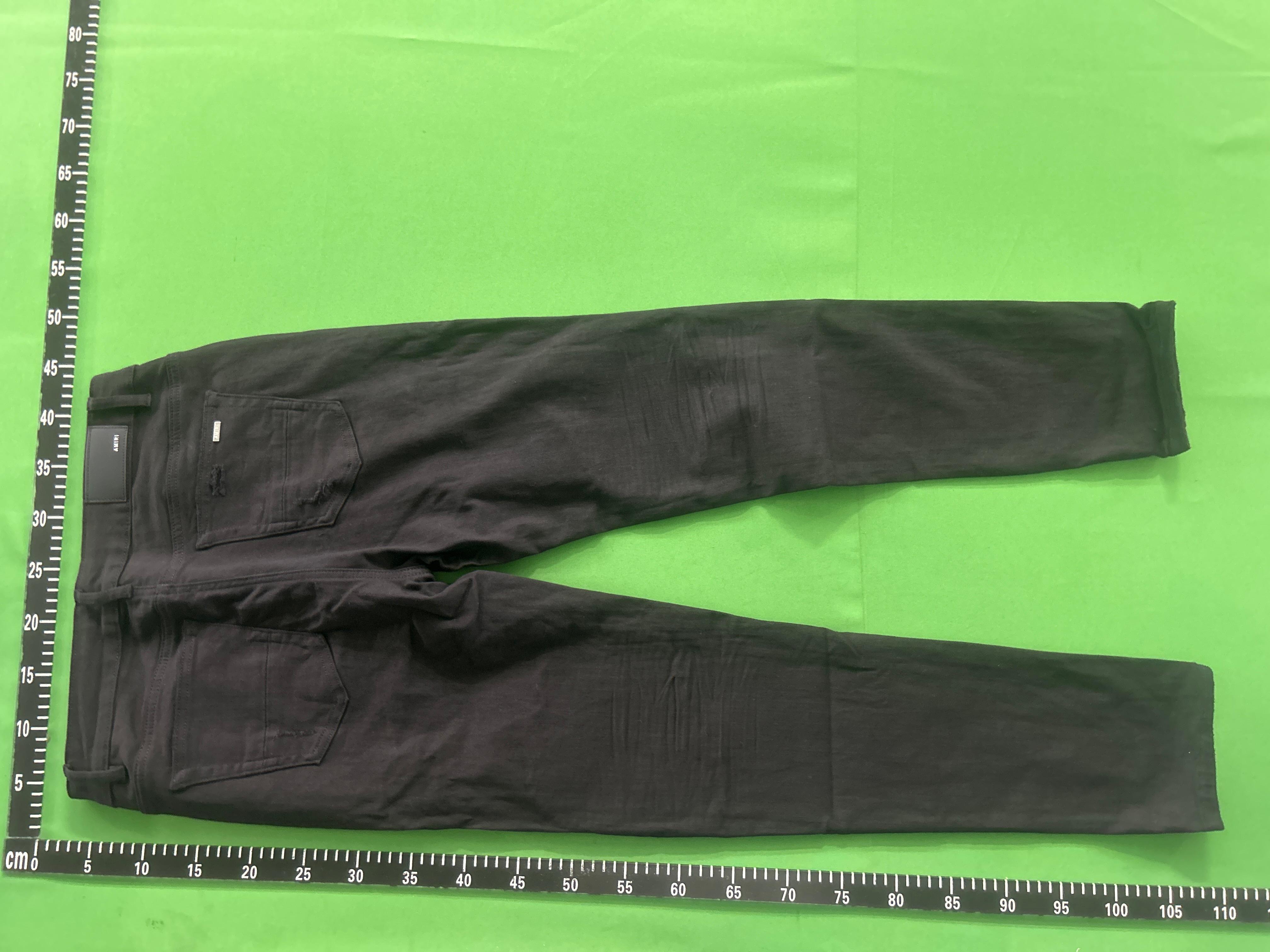 Foto QC 4 de Amiri MX1 Jeans Distressed Slim Fit Light Blue