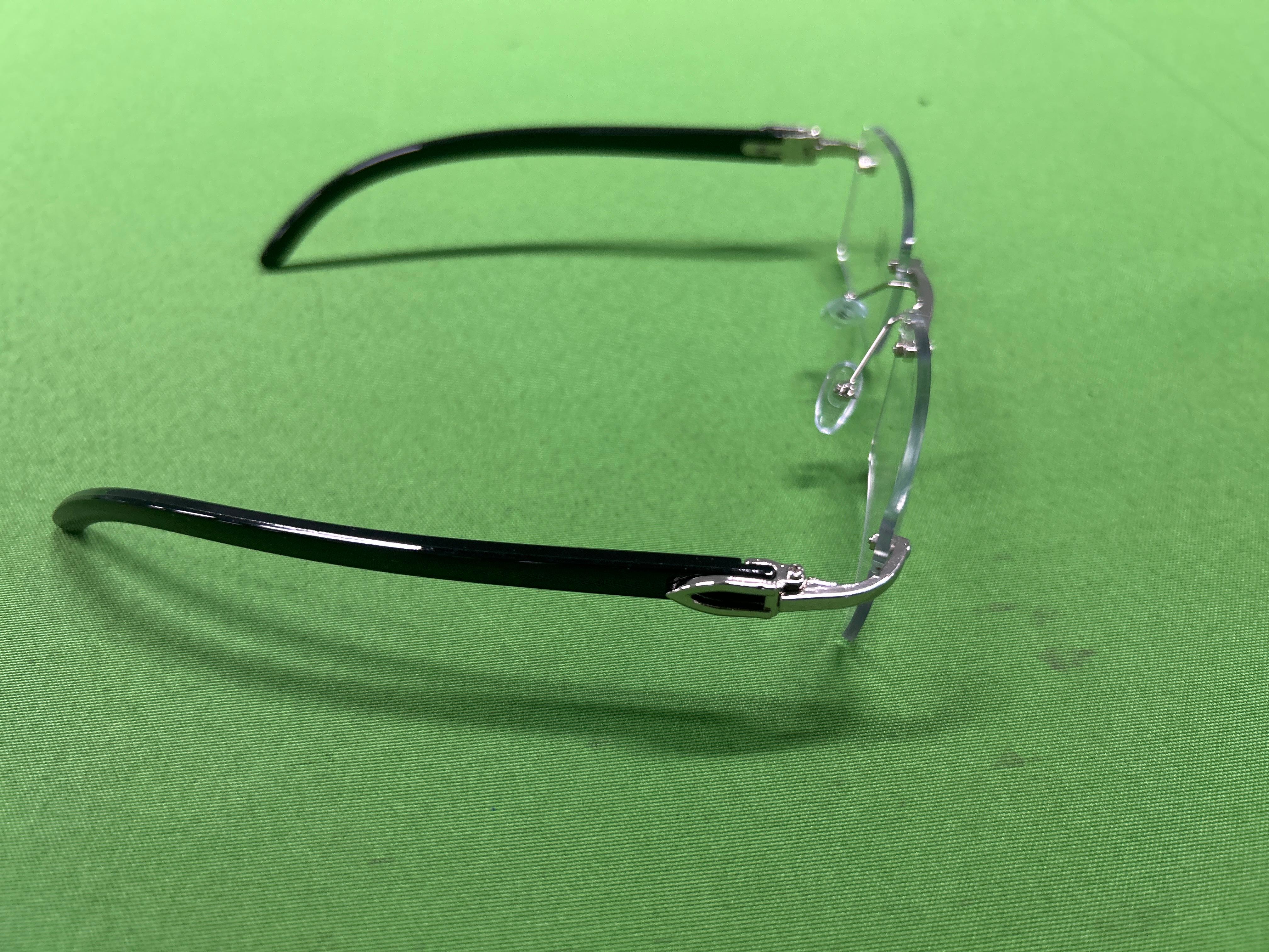 Foto QC 8 de Cartier Rimless Rectangle-Frame Metal Acetate Eyeglasses Gold Black Clear (074-reptz01)