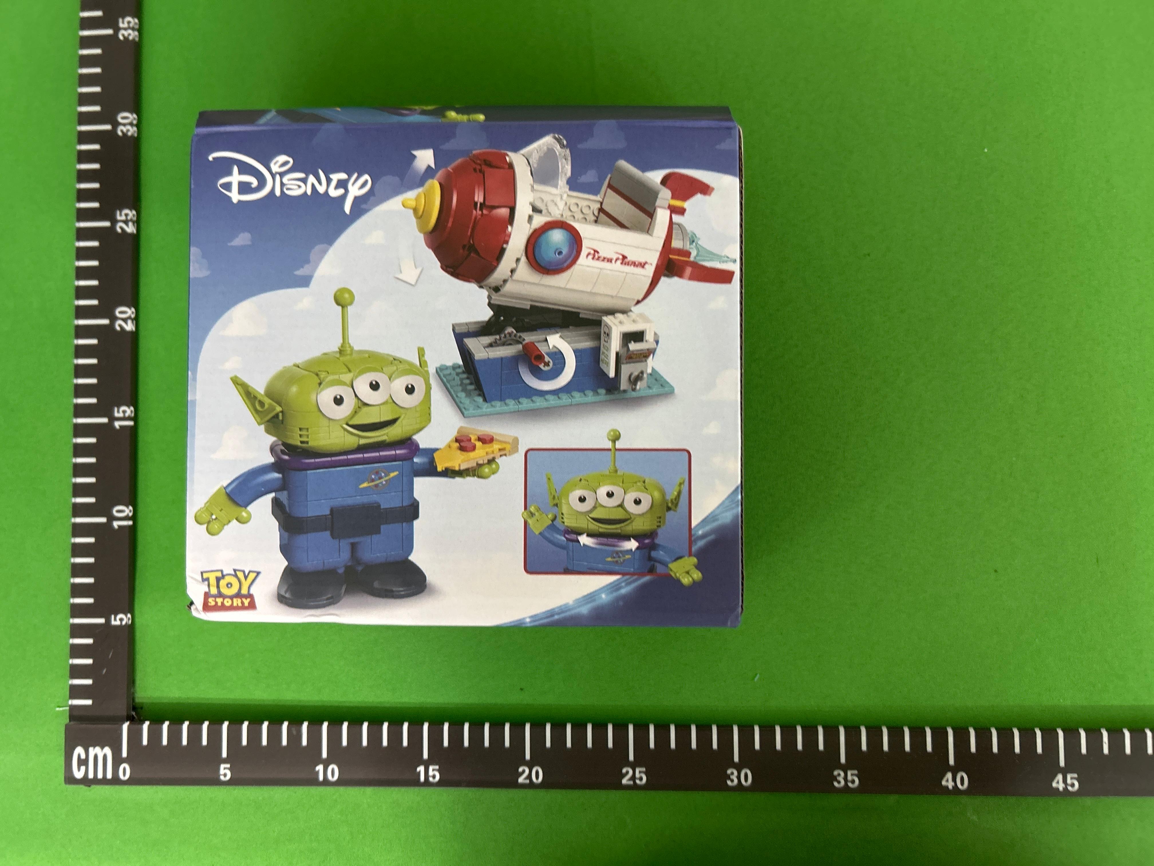 Foto QC 2 de Disney Toy Story Alien Pizza Planet Rocket Ride Building Block Set